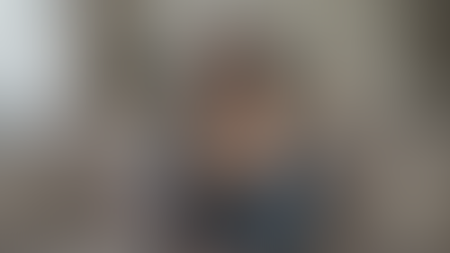 Blurred content preview