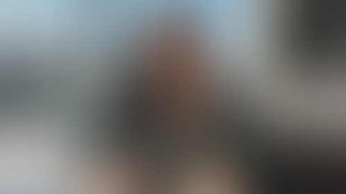 Blurred content preview