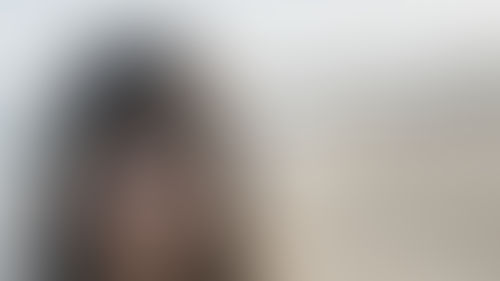 Blurred content preview