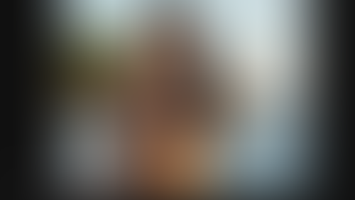 Blurred content preview