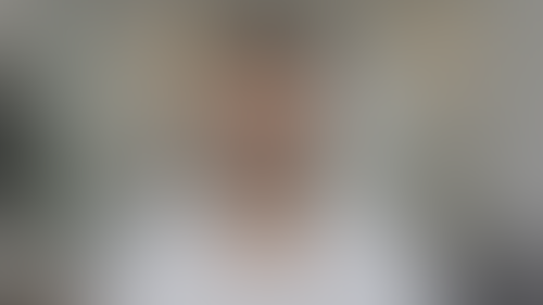 Blurred content preview